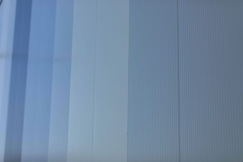 insulated metal panels in varying shades of blue